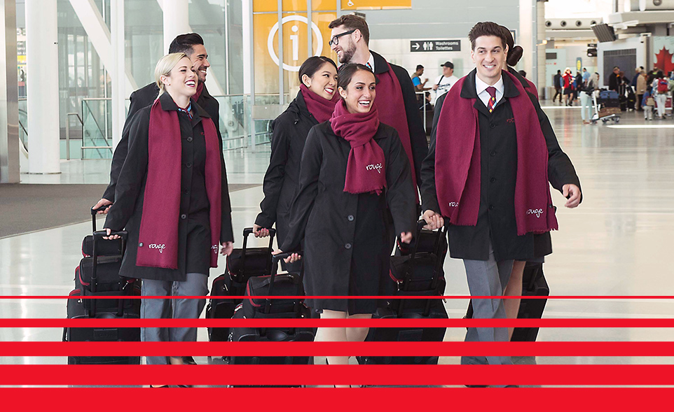Group shot of Rouge flightcrew from behind.